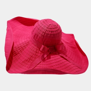 Detail view of the rose red wide brim sun hat with ribbon bow and striped texture