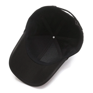 Internal view of a black men's outdoor baseball cap with reinforced seams and sweatband