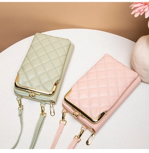 Close-up of quilted PU leather crossbody phone bags with metal frame clasp and zip closure