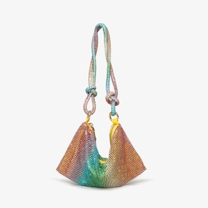 Detailed close-up of rainbow gradient rhinestone handbag with knotted handle and zipper
