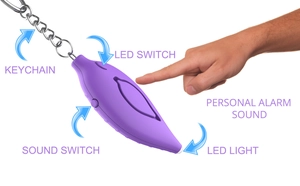 Purple leaf-shaped personal alarm detail with LED switch and metal keychain component
