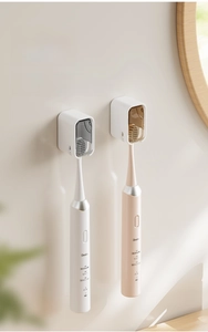 Detail of wall-mounted dustproof electric toothbrush holder with transparent protective cover