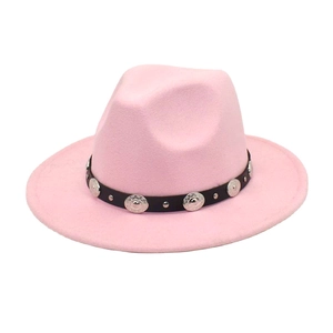 Close-up of pink wool fedora hat with black leather strap and silver metal studs