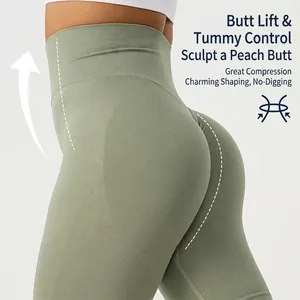 High-waisted seamless peach lift yoga shorts in sage green for fitness and running