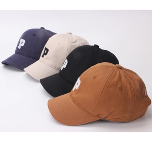 Set of four cotton baseball caps with P embroidery in navy, beige, black, and brown
