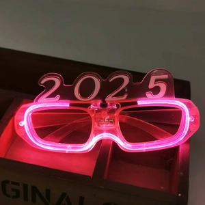 Close-up of 2025 LED shutter glasses with pink glowing lights for New Year party