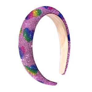 Pink rhinestone padded headband with colorful crystal hearts on white background