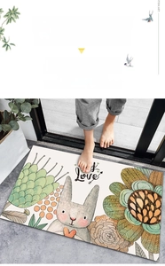Detail of cute rabbit bath mat with Love text shown in a real home entryway usage