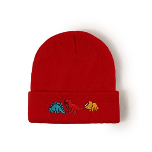 Winter red knitted beanie for kids featuring three cute colorful cartoon dinosaur embroidery