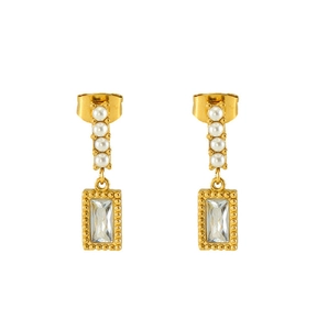 Detail of gold drop earrings with vertical pearls and emerald-cut clear zircon stone