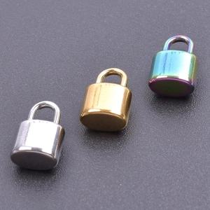 Detail showing small locks in silver, gold, and rainbow finishes for jewelry making