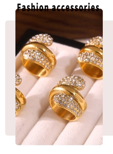 Macro shot of 18K gold plated multi-layer water drop rings with pavé zircon stones