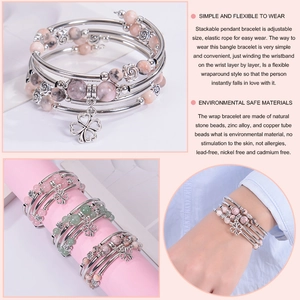 Multi-layer wrap bracelet with pink zebra stones, floral pendant, and adjustable elastic cord