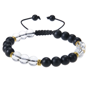 Detail of adjustable braided bracelet with matte stones, clear beads and gold spacers