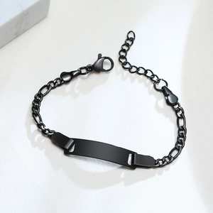 Detail of adjustable matte black stainless steel ID bracelet for kids with engraving plate