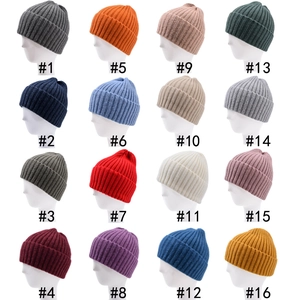 Thick rib-knit beanie set featuring 16 various colors with cuffed rim for outdoor warmth