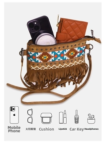 Detail showing interior capacity of bohemian fringe crossbody bag for daily essentials