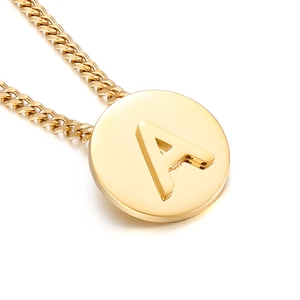 Gold stainless steel necklace featuring a round pendant with a 3D embossed letter A