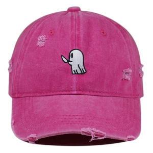 Detail of rose pink distressed baseball cap with white ghost embroidery and torn fabric