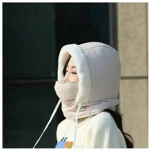 Detail of warm winter trapper hat with thick faux fur lining and windproof neck cover