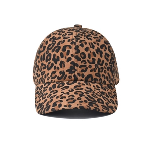 Close-up of leopard print baseball cap showing faux suede texture and stitching details