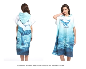 Front and back detail of hooded microfiber beach poncho with blue whale and surfing print