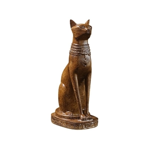 Antique bronze Egyptian Bastet cat statue with detailed engravings on a white background