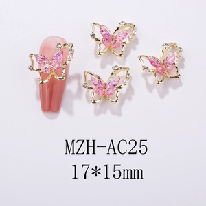 Detail of pink aurora butterfly nail charm with gold frame and pearl accents, size 17x15mm