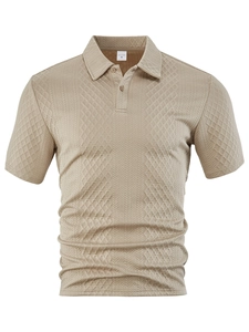 Detail of khaki men's polo shirt showing geometric diamond knit texture and polo collar