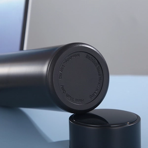 304 stainless steel vacuum mug showing embossed cleaning instructions on matte black base