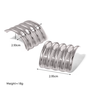 Detailed view of silver ribbed square stud earrings with size specs and metal texture