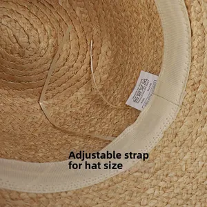 Detail of adjustable inner drawstring and 100% natural raffia straw texture on hat