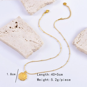 Detail showing the 1.8cm coin pendant necklace with size specifications and 45cm chain length