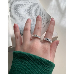 Minimalist S925 sterling silver wide rings with colorful zircon stones on person's hand