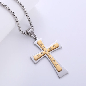 Two-tone gold and silver stainless steel cross pendant necklace with sparkling CZ stones