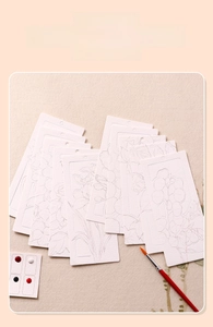 Macro view of 10-piece hollow floral watercolor bookmarks with pigments and brushes