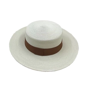 Elegant wide-brim boater hat in white straw with a classic brown grosgrain ribbon band