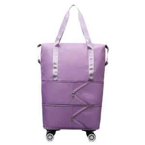Expandable purple travel bag with wheels made of durable waterproof nylon fabric