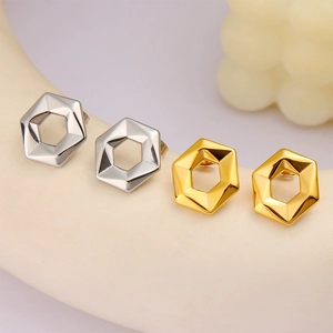 Minimalist hexagonal hollow stud earrings in polished gold and silver stainless steel