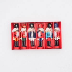 Set of six colorful 12cm wooden Nutcracker soldiers in a red gift box for Christmas decor