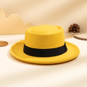 Flat top yellow wool felt fedora featuring a classic black grosgrain ribbon detail