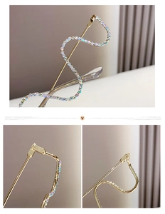Detail of gold metal glasses frame with colorful rhinestones and wave hinge design