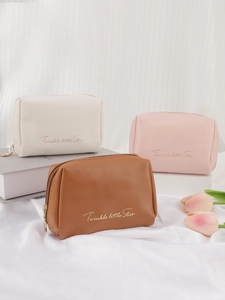 Trio set of mini PU leather makeup bags in beige, pink and tan with gold star text