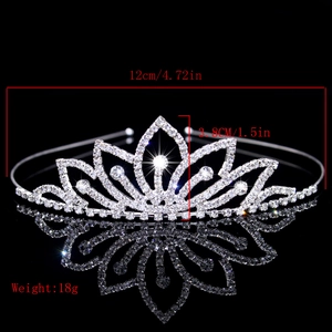 Silver bridal tiara with rhinestones measuring 12cm wide and 3.8cm in height