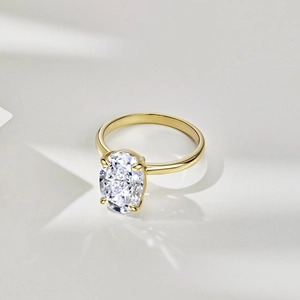 Macro shot of S925 sterling silver ring with oval ice flower cut zircon and gold plating