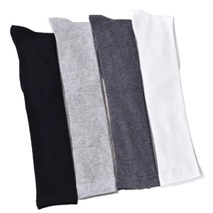 Flat lay detail showing four colors of ribbed knit knee-high socks with triple stripes