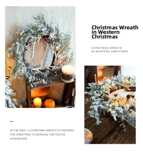 Detail of Christmas wreath with snowy pine needles, pine cones, deer antlers and warm LED lights