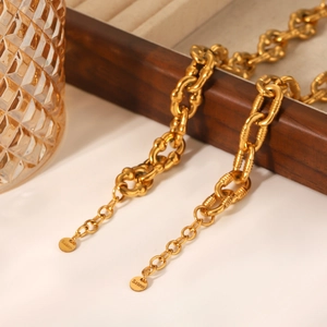 Elegant 18K gold-plated stainless steel chunky link bracelet on a sophisticated background