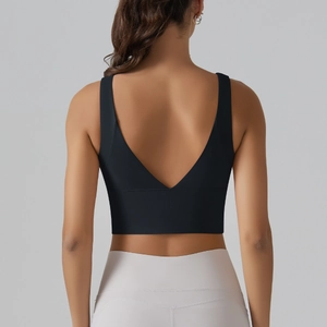Detailed back view of a black V-shaped open back sports bra with wide straps for yoga