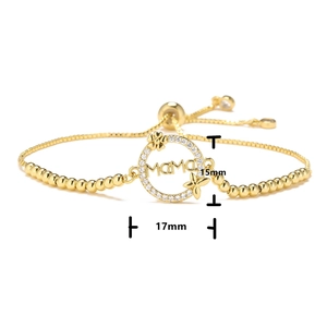 Detail of adjustable golden bead bracelet with MAMA pendant measuring 15mm by 17mm